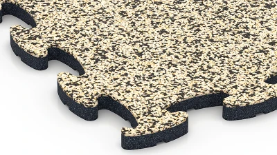 Close-up of WARCO XT rubber tiles showing precise interlocking tabs, even format and clean edges