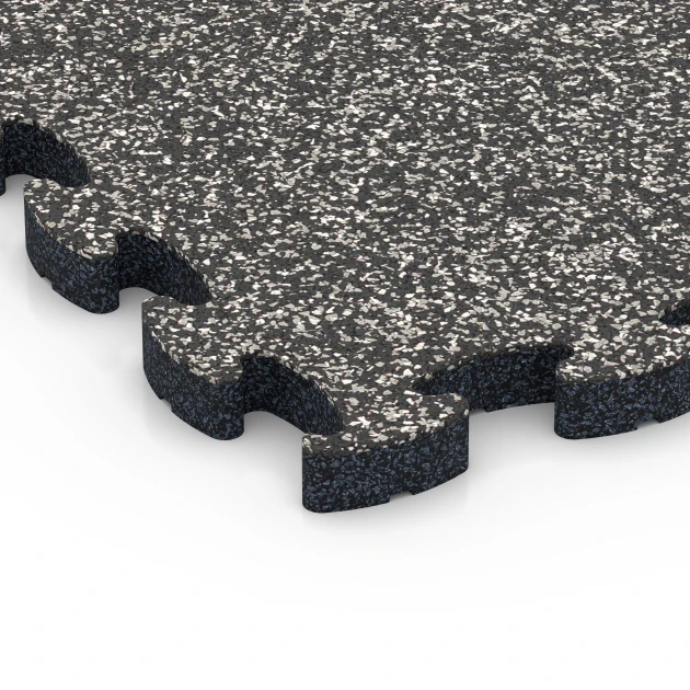 Detailaufnahme der Randausprägung von WARCO-Produkt 6931, Safety Puzzle Tile, Format 44,6 x 44,6 × 2,8 cm, Farbe Dark Grey Granite.