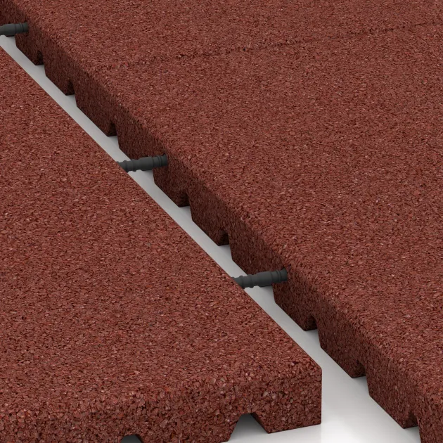 Großaufnahme vom Verbindungssystem von WARCO-Boden 5665 - Playground Safety Mat 4 cm - EN 1177 ≤ 110 cm im Farbdesign Brick red. Abmessungen 1000 x 1000 x 40 mm.