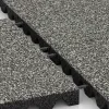 Großaufnahme vom Verbindungssystem von WARCO-Boden 0641 - Playground safety tile im Farbdesign Gray Granite. Abmessungen 500 x 500 x 45 mm.