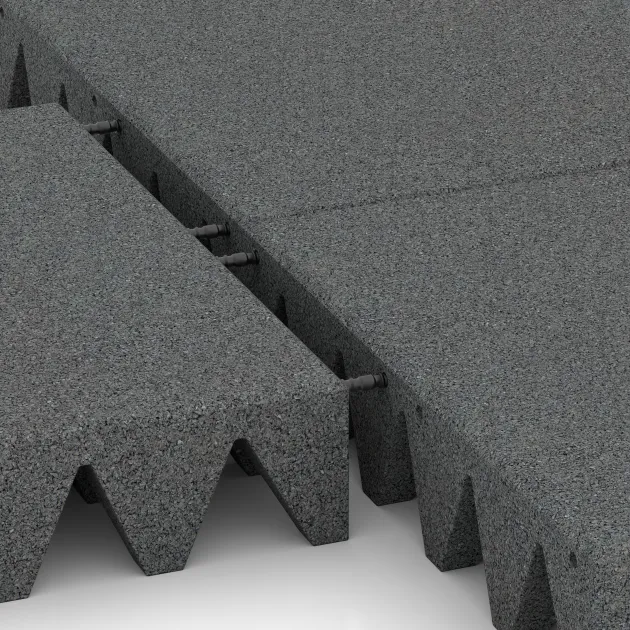 Großaufnahme vom Verbindungssystem von WARCO-Boden 5626 - Playground Safety Tile 10 cm - EN 1177 ≤ 300 cm im Farbdesign Slate grey. Abmessungen 500 x 500 x 100 mm.