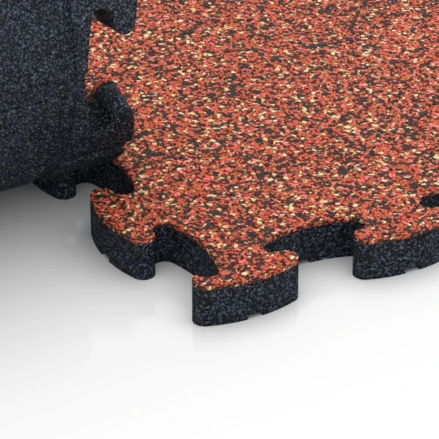 Großaufnahme vom Verbindungssystem von WARCO-Boden 6935 - Safety Puzzle Tile im Farbdesign Embers. Abmessungen 44,6 x 44,6 × 2,8 cm.
