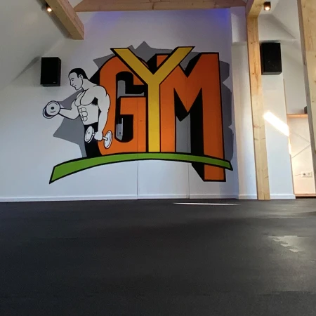 A smooth looking solid gym floor has been layed in this gym. A lot of space for cardio and group activities has been created with a nice anti slip surface for added saftey, and contact noise reduction